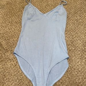 Blue body suit
